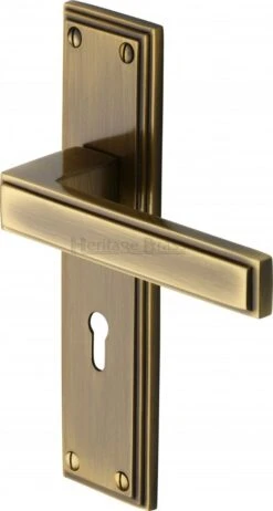 Atlantis Lever Door Handles On A Backplate - Antique Brass (Gloss Lacquered)