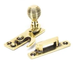 Beehive Hook Pattern Sash Fastener - Aged Brass Unlacquered