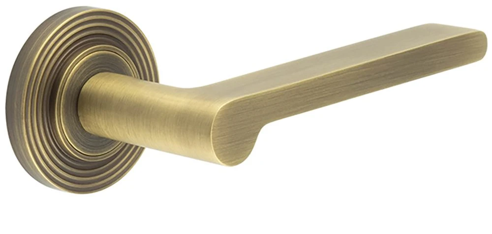 Blade Pattern Lever Handles With Reeded Round Rose - Suitable For Use With FD30 / FD60 Fire Doors - Antique Brass (Lacquered)