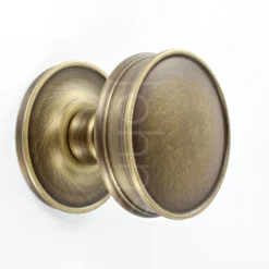 Classic Design Cupboard Knob With Stepped Rose - Antique Brass (Lacquered)