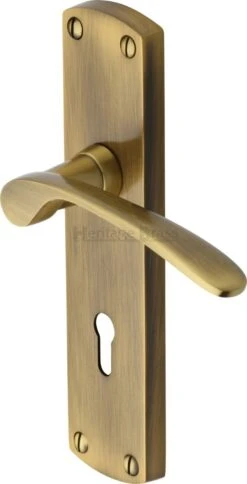 Diplomat Lever Door Handles On A Backplate - Antique Brass (Gloss Lacquered)