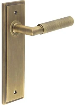 Knurled Pattern Lever Handle On A Large Rectangular Backplate - Antique Brass (Lacquered)
