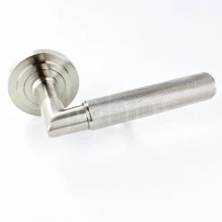 Knurled Pattern Lever Handles With Stepped Round Rose - Suitable For Use With FD30 / FD60 Fire Doors - Satin Nickel