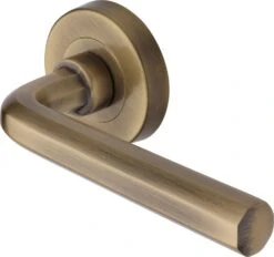 Octave Lever Handle On Round Rose - Antique Brass (Gloss Lacquered)