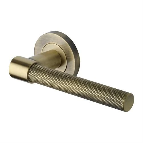 Phoenix Knurled Lever Handle On Concealed Fix Round Rose - Antique Brass (Gloss Lacquered)