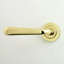 Laguna Lever - Round Rose Door Handles - Polished Brass Plated - Suitable For Use With FD30 / FD60 Fire Doors
