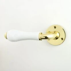 Plain White Porcelain Lever On Rose - Carlisle Brass - Polished Brass - Suitable For Use With FD30 / FD60 Fire Doors