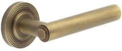 Tubular Pattern Lever Handles With Stepped Ends On Reeded Round Rose - Suitable For Use With FD30 / FD60 Fire Doors - Antique Brass (Lacquered)