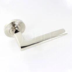 Wedge Pattern Lever Handles With Reeded Round Rose - Suitable For Use With FD30 / FD60 Fire Doors - Polished Nickel