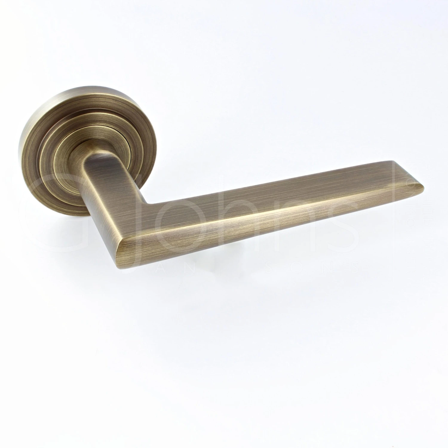 Wedge Pattern Lever Handles With Stepped Round Rose - Suitable For Use With FD30 / FD60 Fire Doors - Antique Brass (Lacquered)