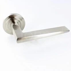Wedge Pattern Lever Handles With Stepped Round Rose - Suitable For Use With FD30 / FD60 Fire Doors - Satin Nickel
