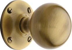 Westminster Round Mortice Knobs - Antique Brass (Gloss Lacquered)