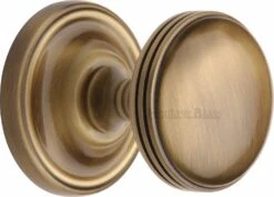 Whitehall Round Mortice Knobs - Antique Brass (Gloss Lacquered)